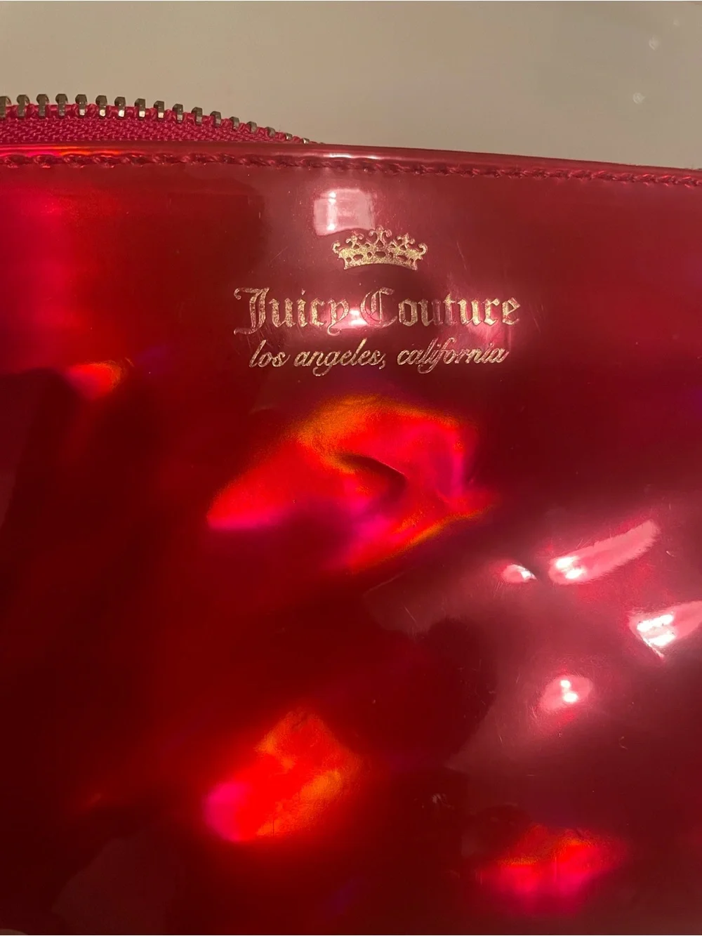 Juicy Couture Iridescent pink Cosmetic Pouch with Gold Logo